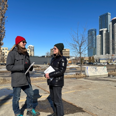 Trevor Chow-Fraser and Danielle Soneff in a parking lot that will be part of Warehouse Park downtown